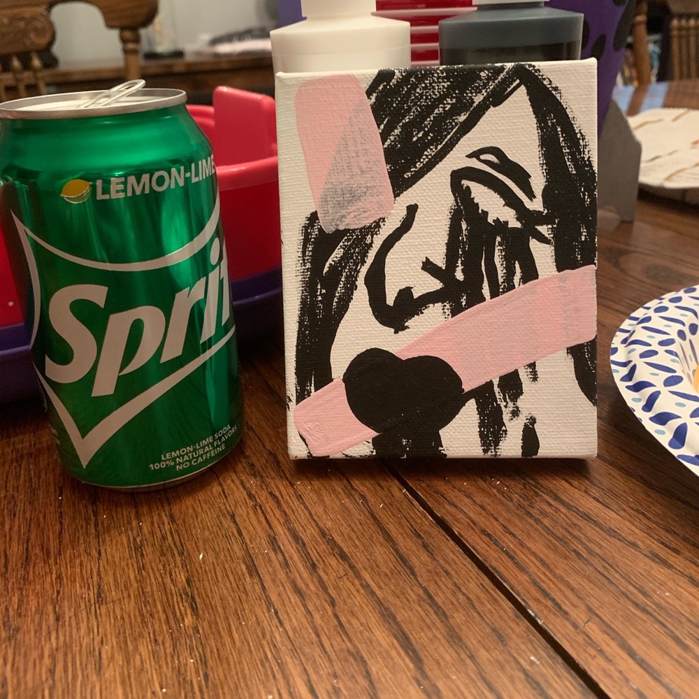 Crying woman painting